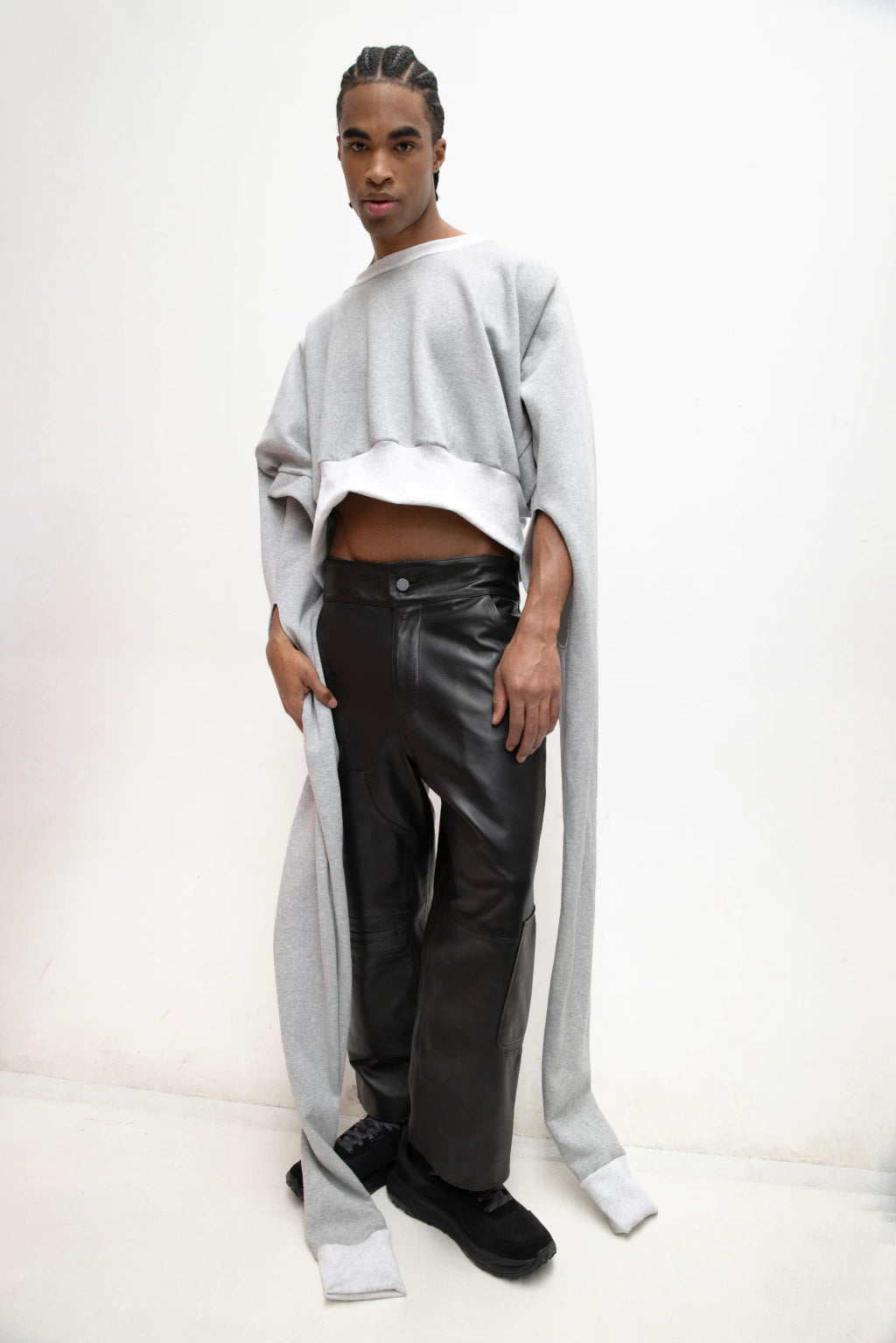 MANCANDY Trans Wrap Sweatshirt with extended wrap-around sleeves and transformable oversized silhouette.