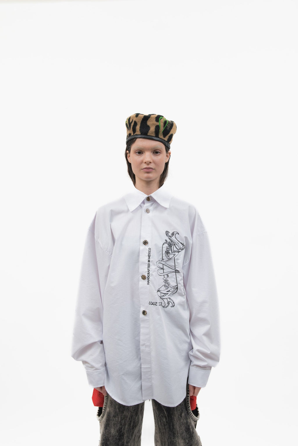 Officer Cap in leopard wool felt styled with an oversized white shirt.