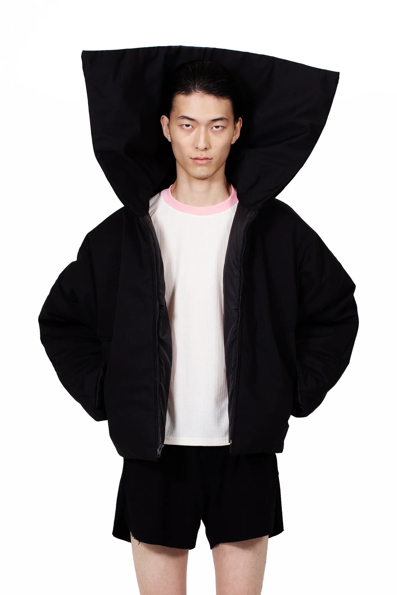 Black Nevado Puffer Jacket with oversized padded construction and metal zip closure.
