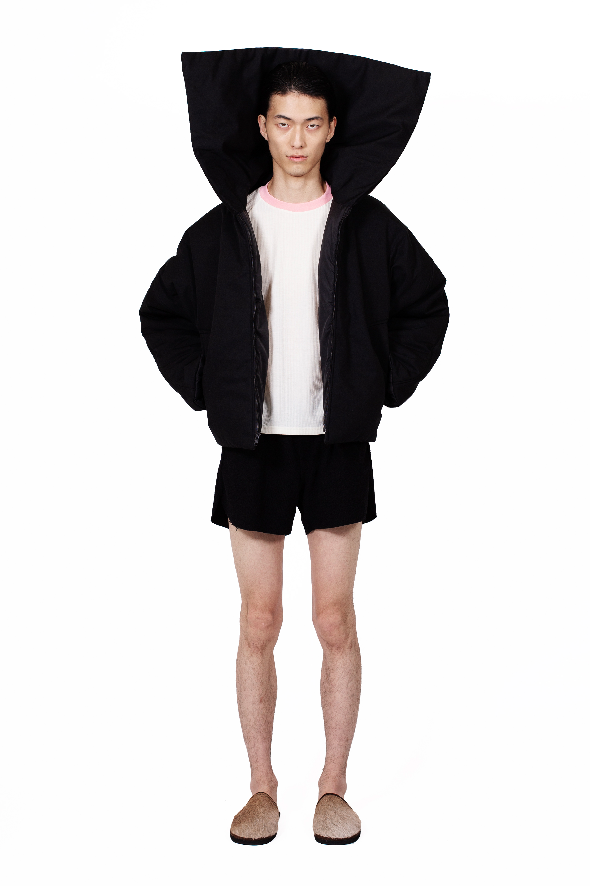 Black Nevado Puffer Jacket with oversized padded construction and metal zip closure.