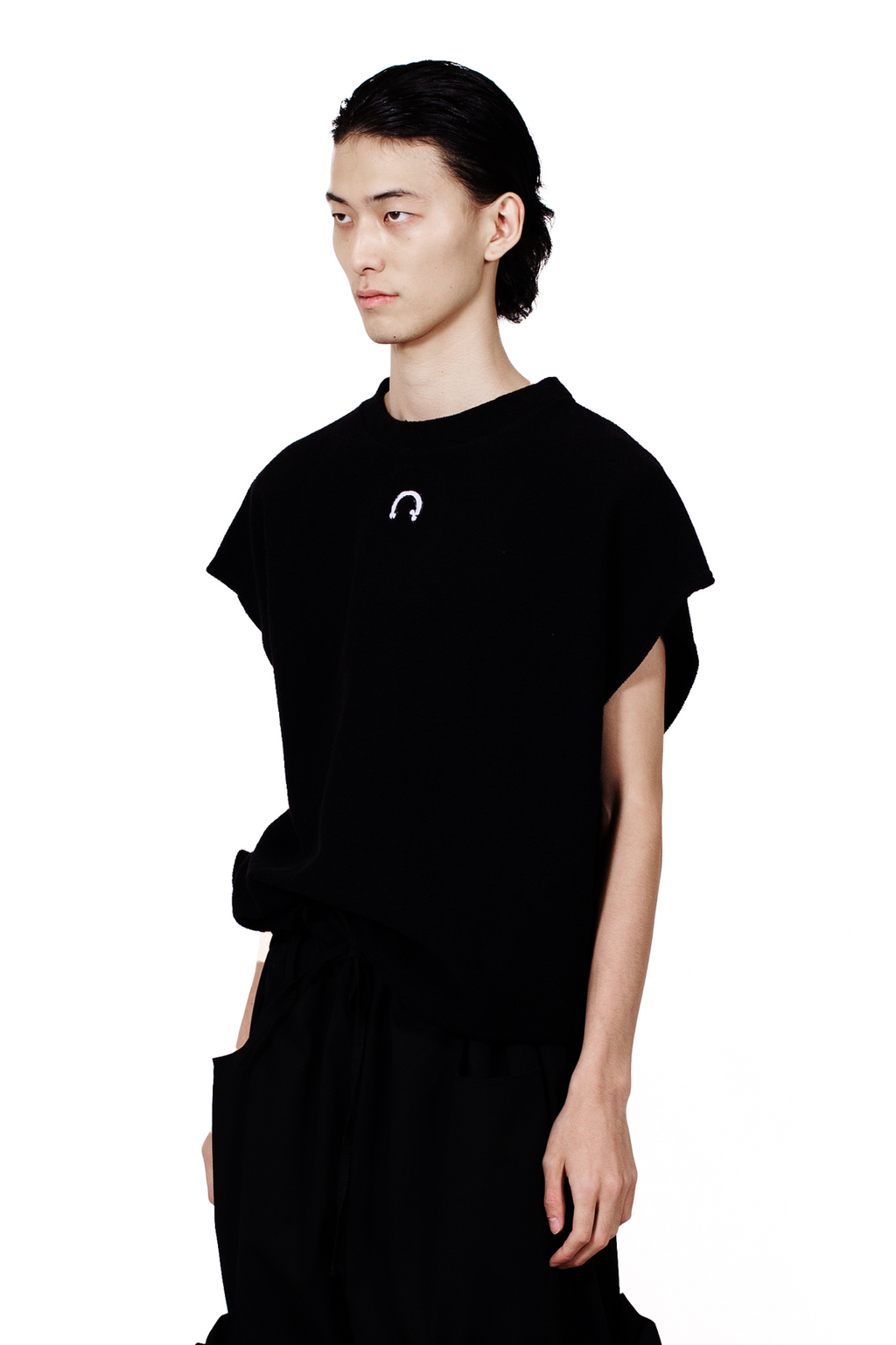MANCANDY Horseshoe Muscle Tank crafted from French terry featuring a boxy silhouette, sleeveless construction and embroidered horseshoe motif at the chest.