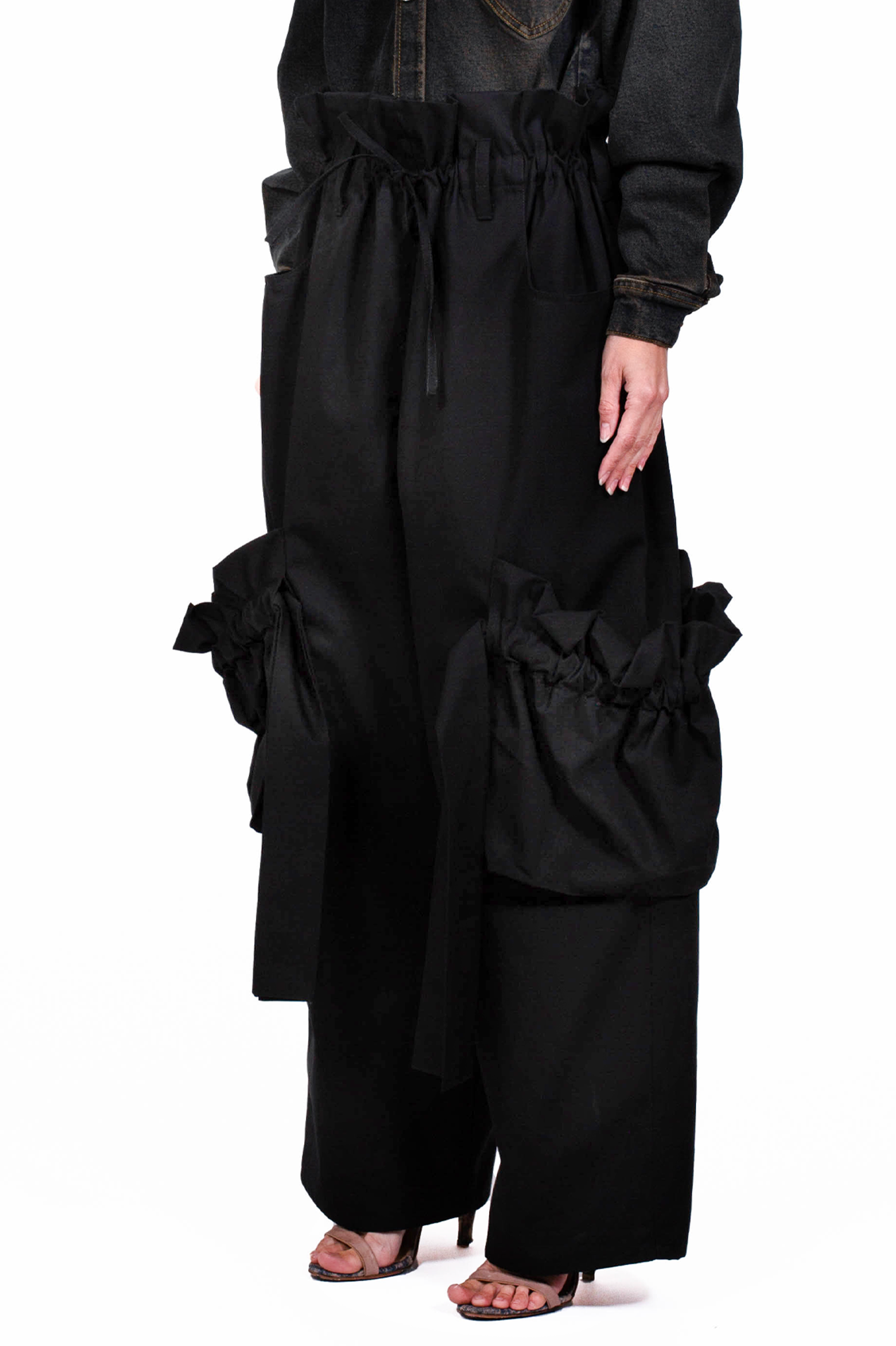 MANCANDY Samurai Cargo Pants in cotton gabardine featuring an adjustable paper-bag waist, oversized cargo pockets and a wide-leg silhouette.