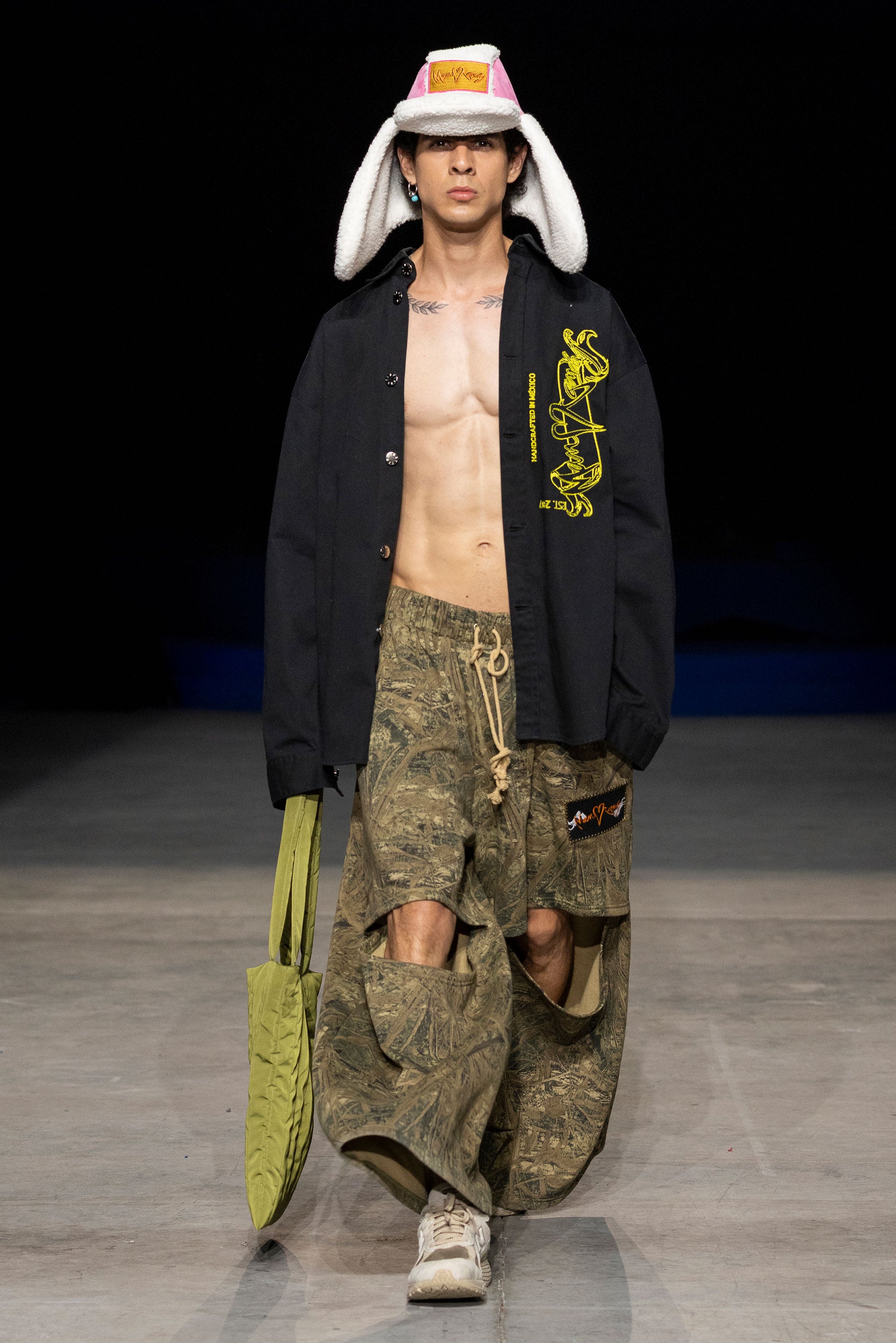 MANCANDY Deconstructed Sweatpants in camouflage heavyweight fleece featuring oversized wide legs, front cut-outs and extended length.