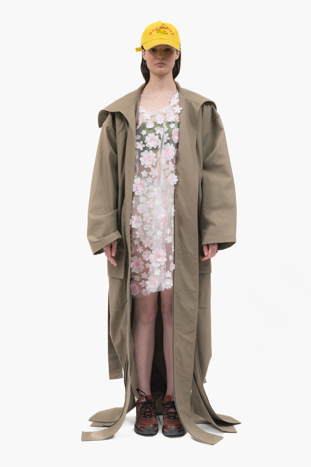 MANCANDY Dust Trench in khaki ripstop featuring an extra-long silhouette, oversized collar, utility pockets and trailing straps.