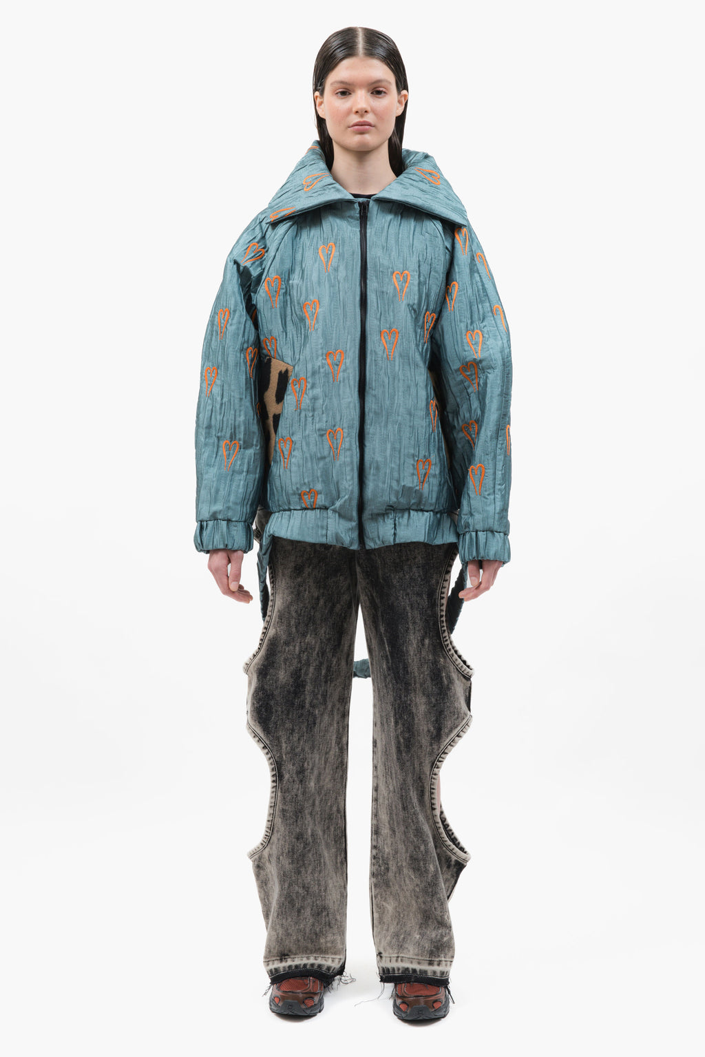 Hearts Bomber Jacket in textured blue steel fabric with all-over heart embroidery and oversized silhouette.