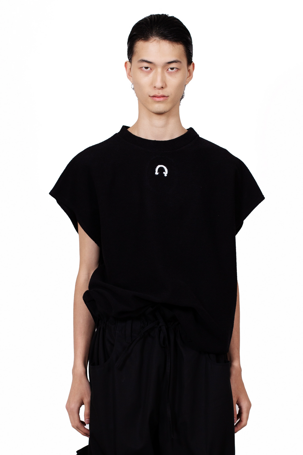 MANCANDY Horseshoe Muscle Tank crafted from French terry featuring a boxy silhouette, sleeveless construction and embroidered horseshoe motif at the chest.