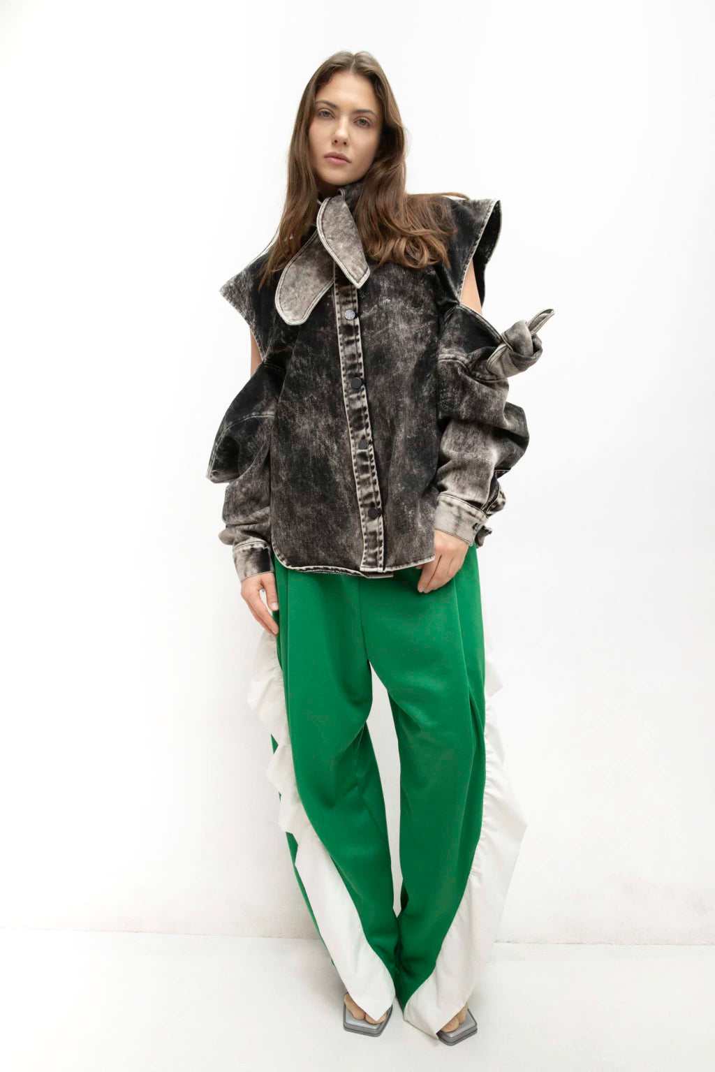 Transformable acid wash denim shirt by MANCANDY featuring integrated tie sleeves, architectural shoulders and a convertible vest-like silhouette.