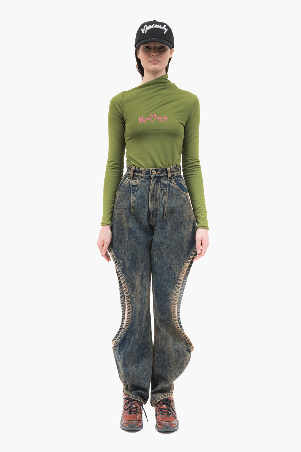 MANCANDY One Bite Jeans Dusty Blue in 100% cotton denim featuring a signature side cut-out, sculpted front pleat detail and embroidered back pocket logo.