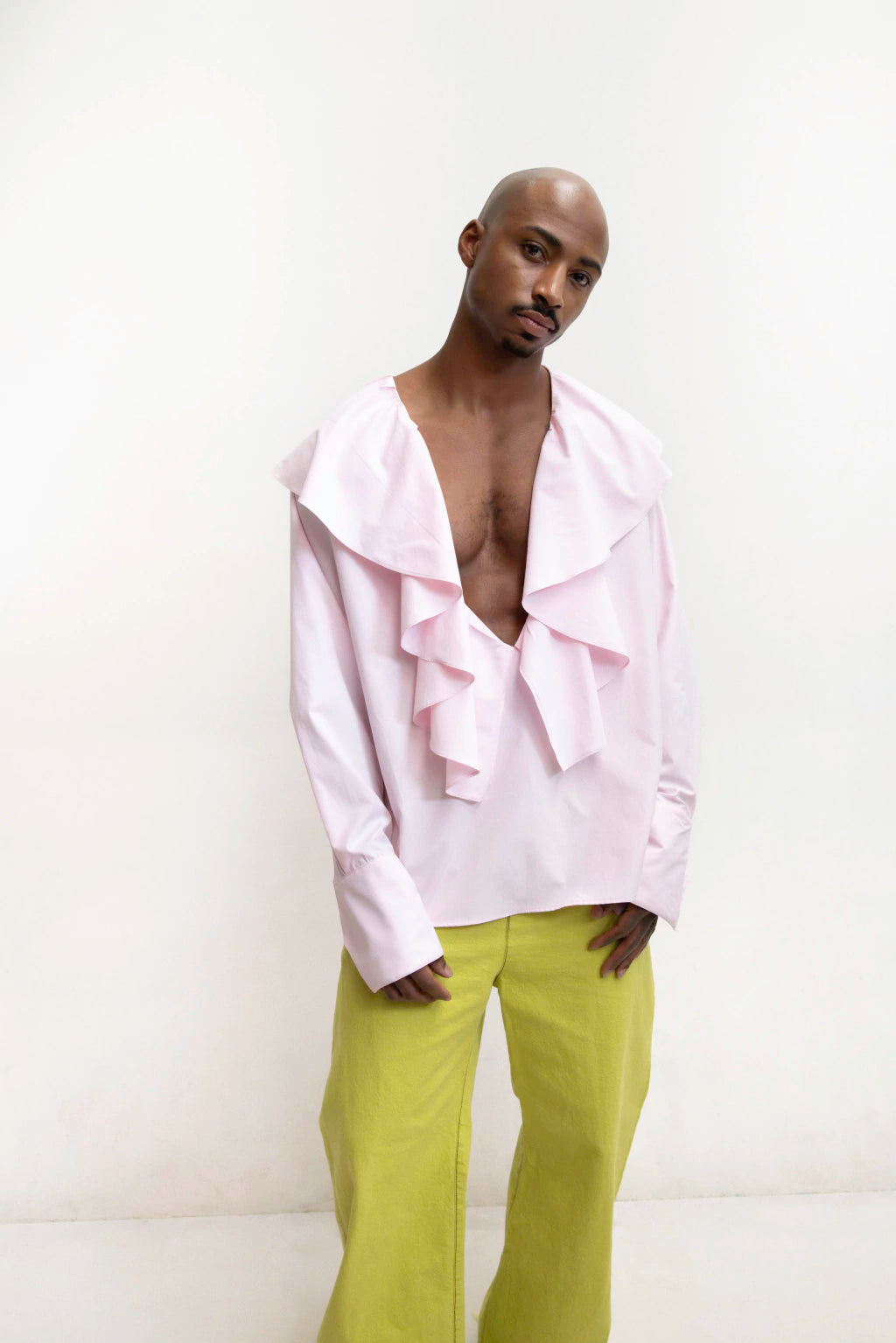 MANCANDY The Lover Shirt in soft pink poplin with cascading ruffles and deep open neckline.