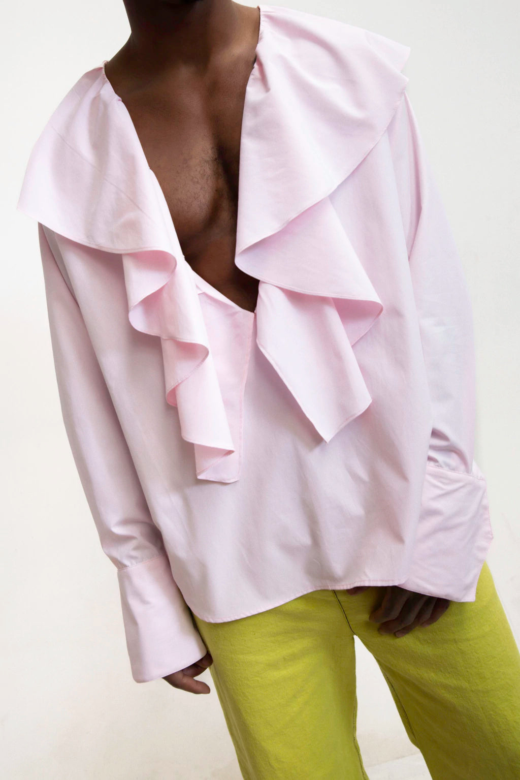 MANCANDY The Lover Shirt in soft pink poplin with cascading ruffles and deep open neckline.