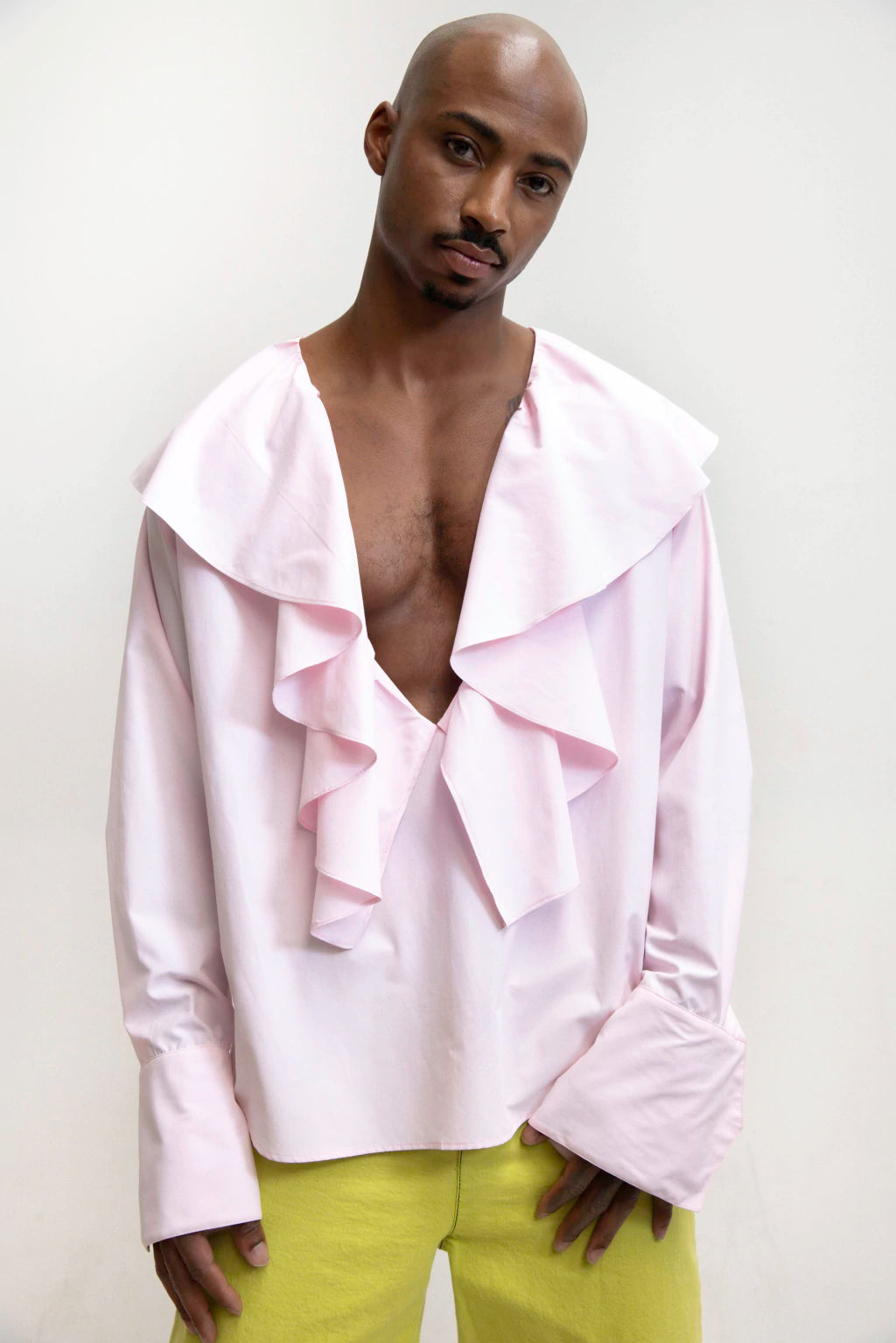 MANCANDY The Lover Shirt in soft pink poplin with cascading ruffles and deep open neckline.