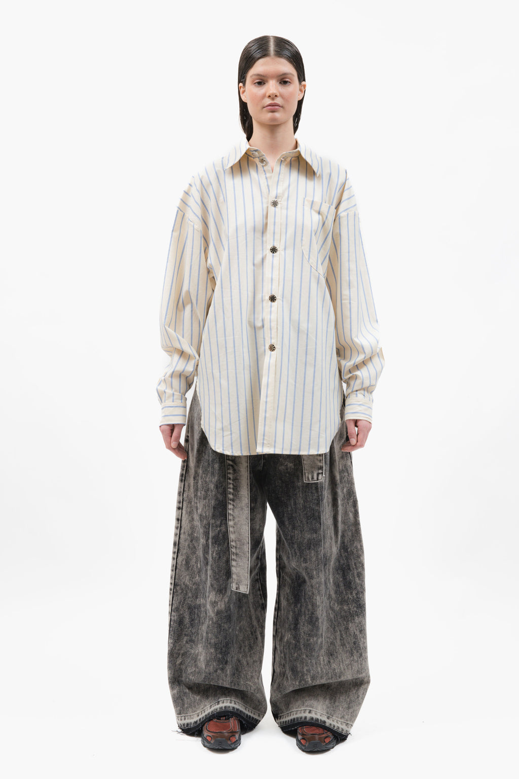 A classic office shirt seen through the lens of MANCANDY. Cut in crisp striped cotton with an oversized silhouette.