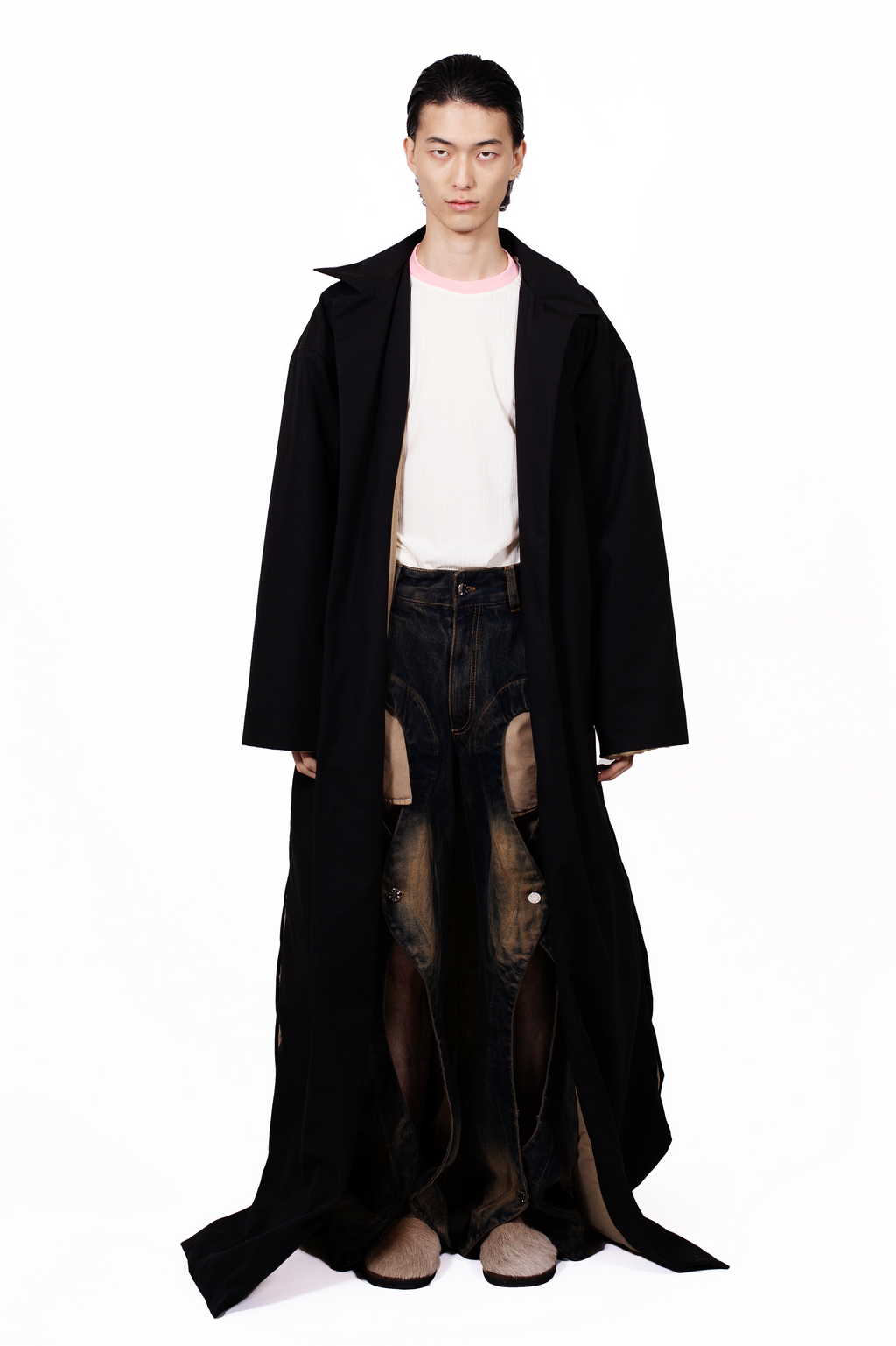 Vampire Coat in cotton gabardine with quilted lining, extra-long silhouette and side slits.