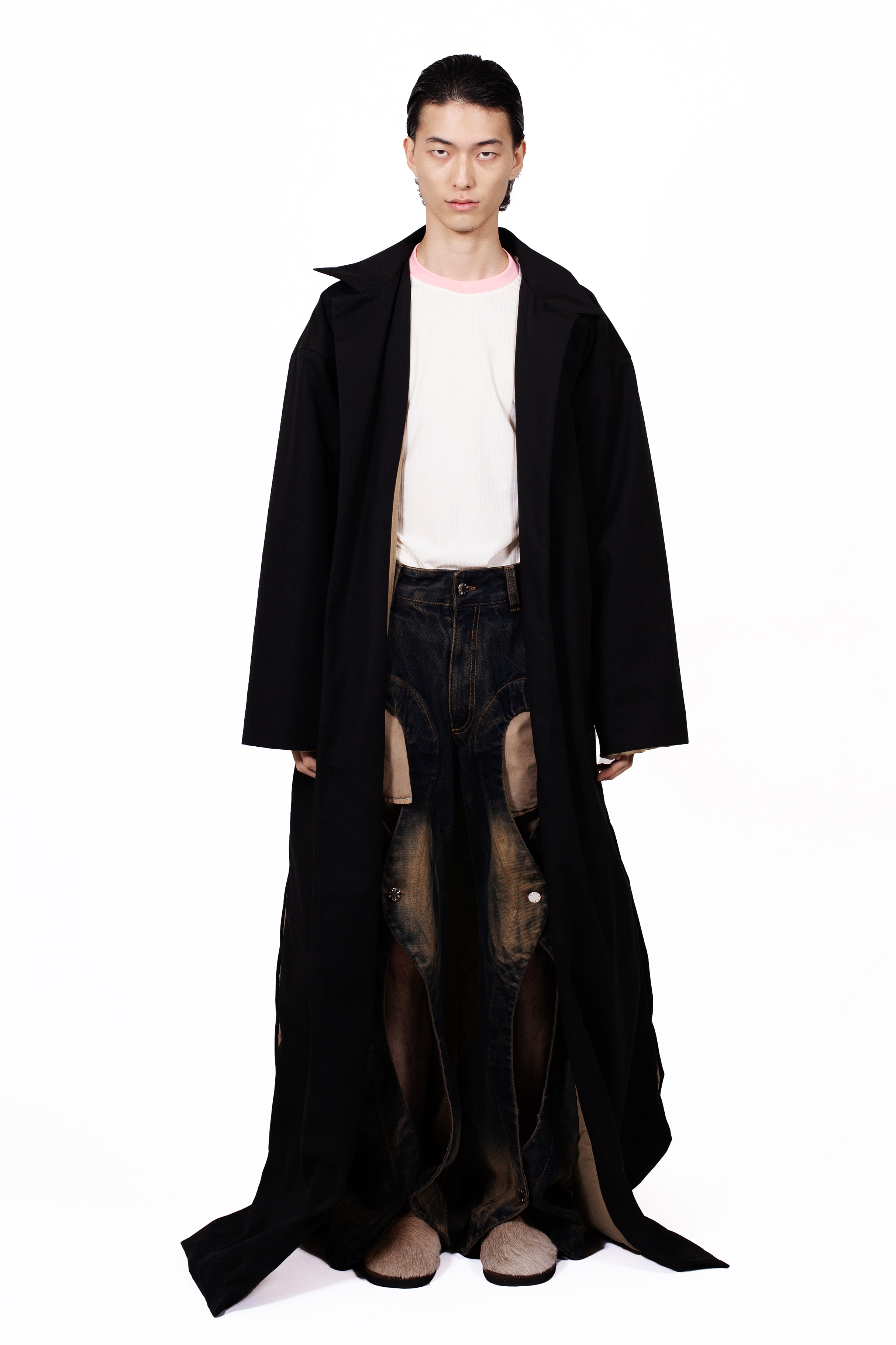 Vampire Coat in cotton gabardine with quilted lining, extra-long silhouette and side slits.