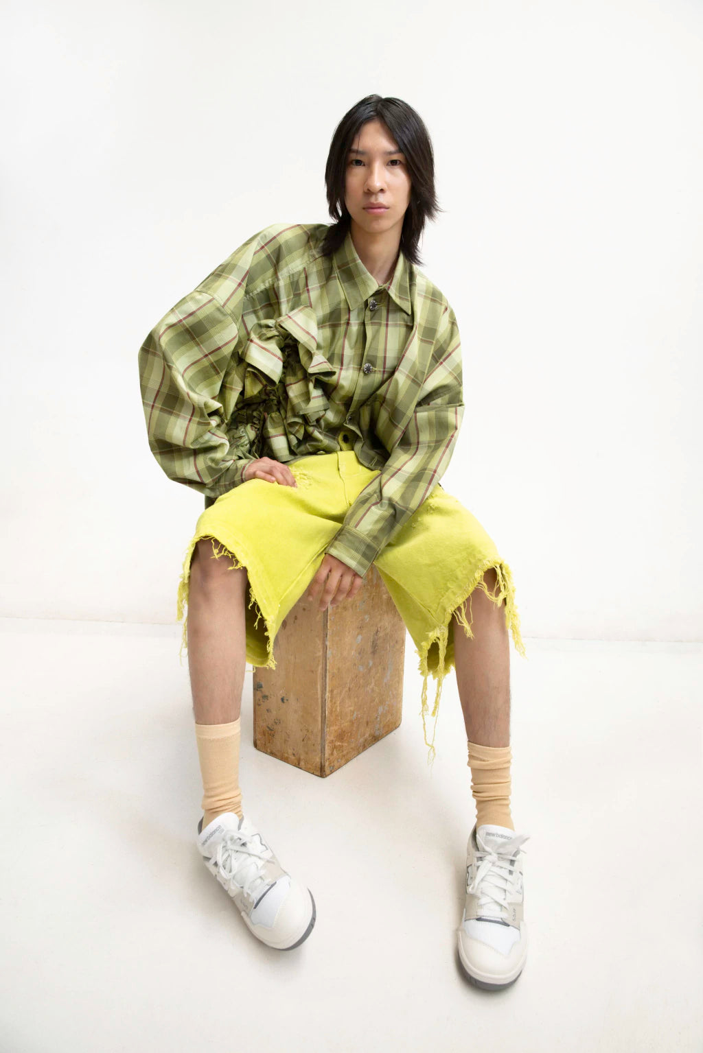MANCANDY Ruffled Plaid Wide Shirt featuring an adjustable drawstring front drape, oversized silhouette and sculptural volume.