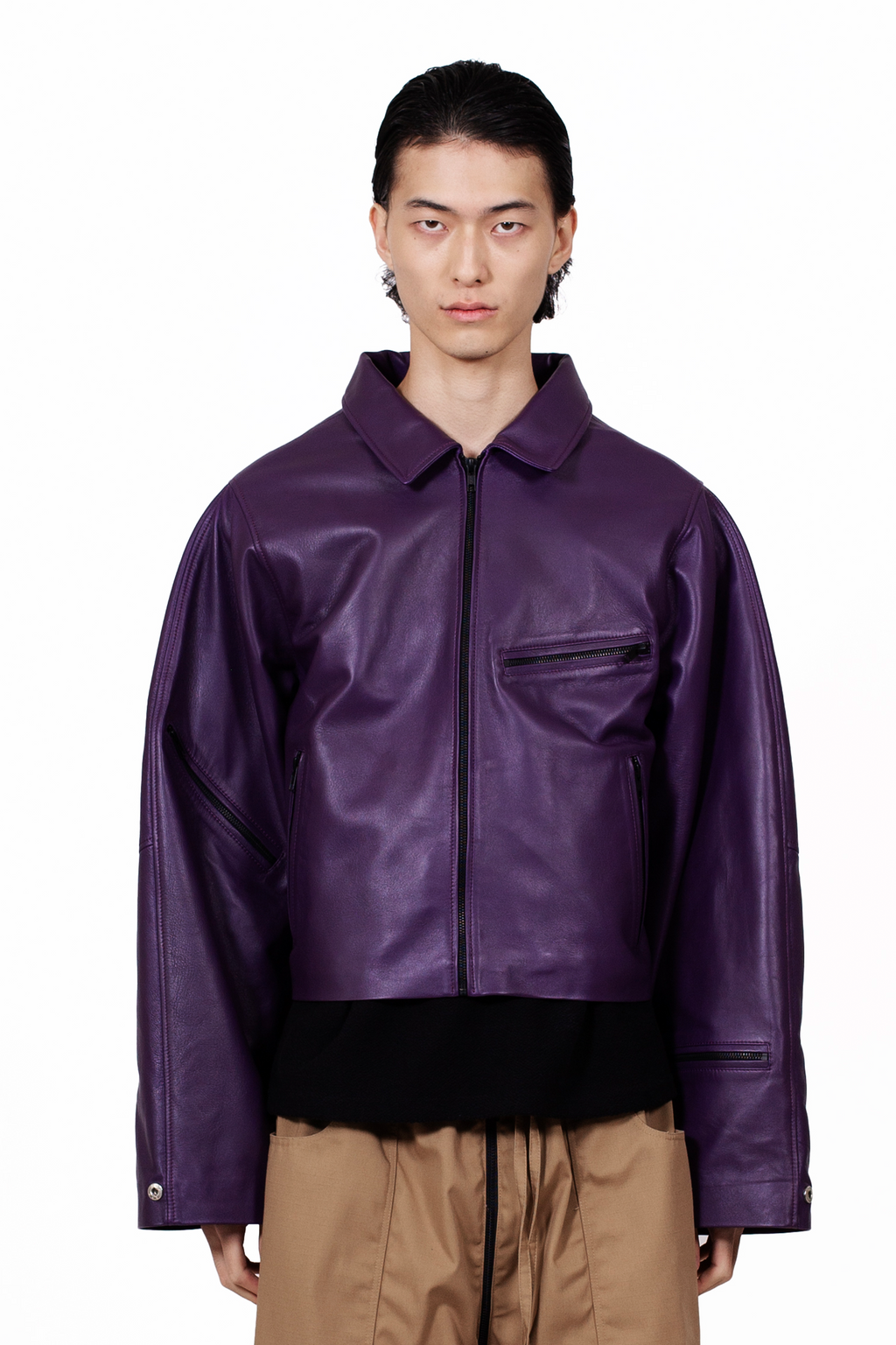 MANCANDY Racer Leather Jacket featuring a cropped oversized silhouette, open collar, black metal hardware, sleeve zip pocket and utility-inspired detailing.