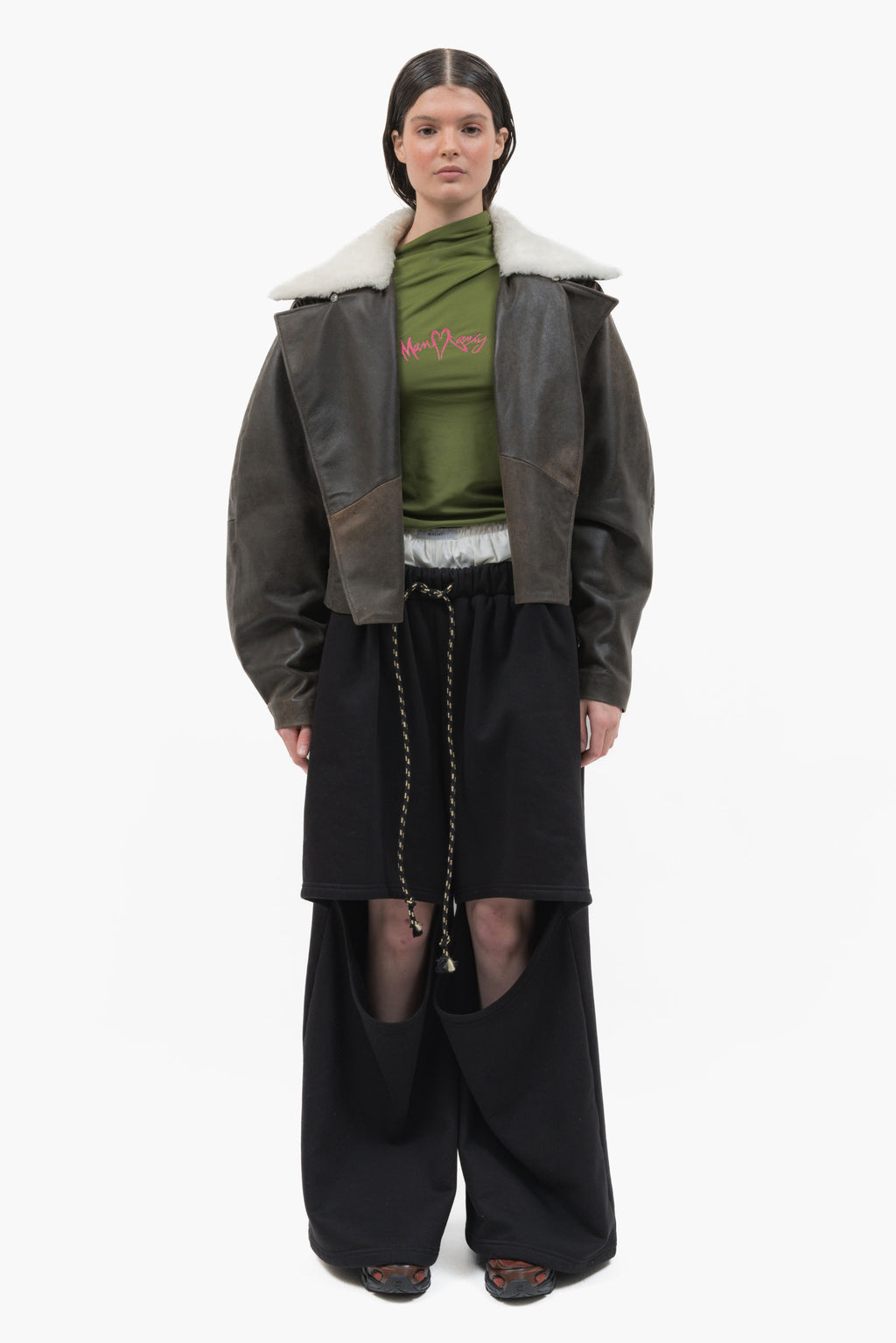 MANCANDY Wide Aviator Jacket in crackled black leather featuring a detachable shearling collar, oversized fit and curved sleeves.